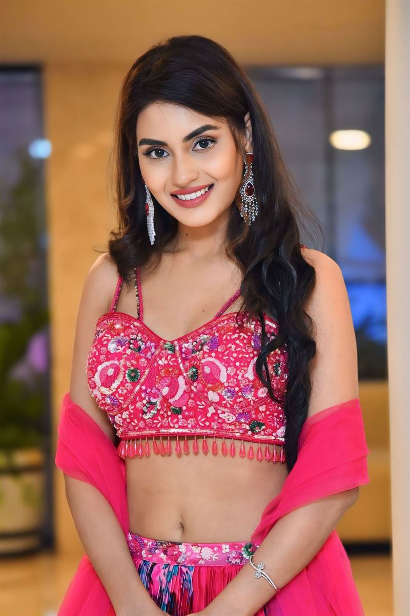 Telugu Girl Garima Chouhan Stills In Red Lehenga Choli